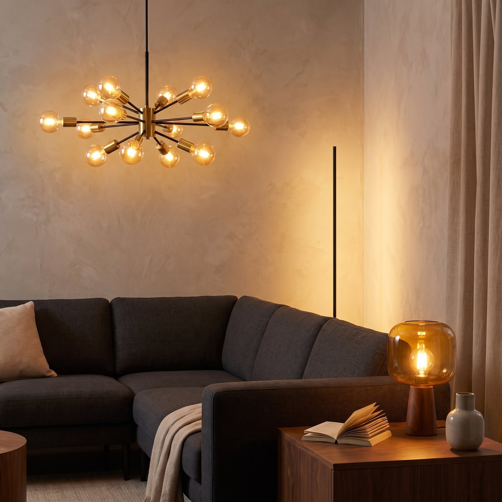 A warm brass table lamp with a linen shade casting soft light