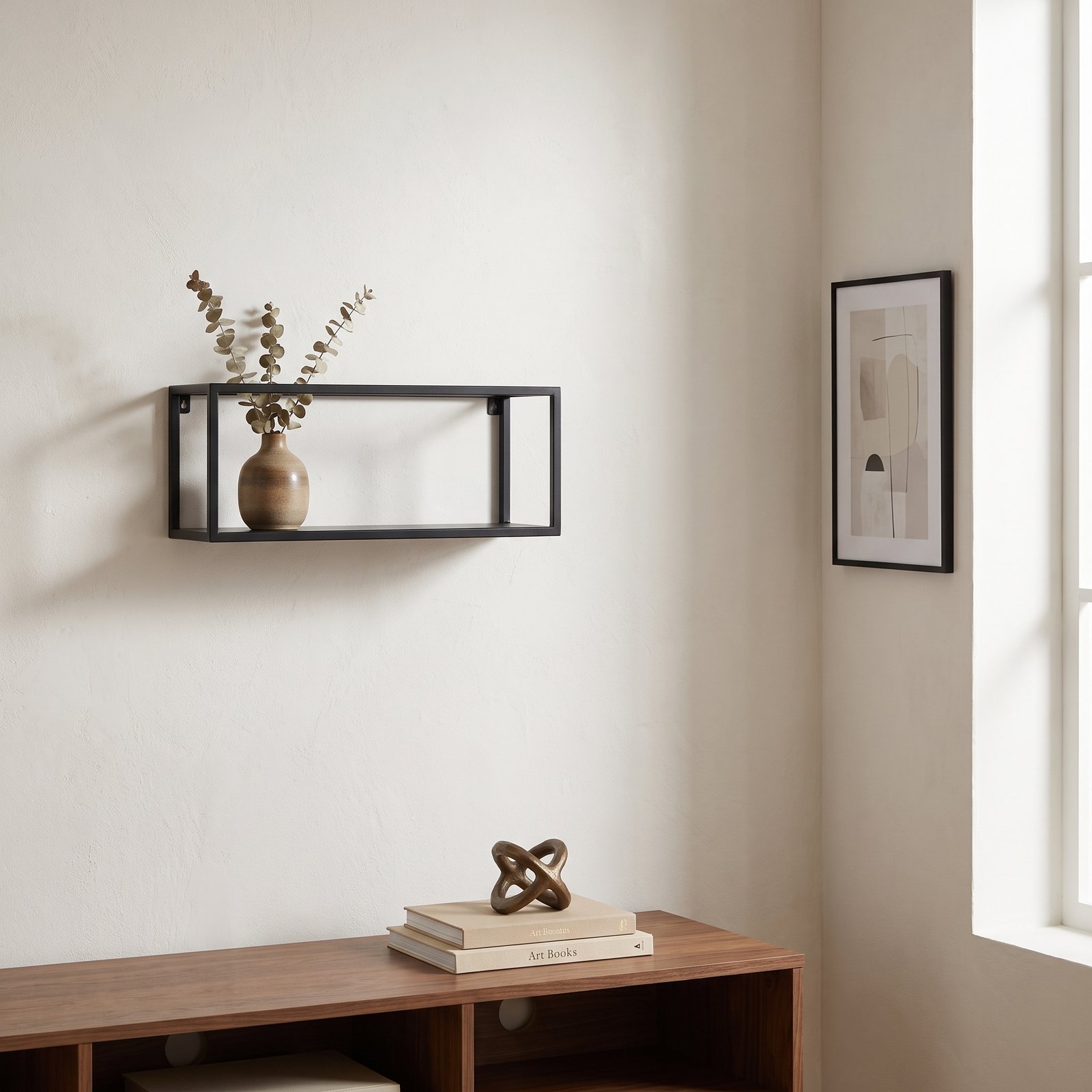 A framed abstract wall art piece in muted earth tones